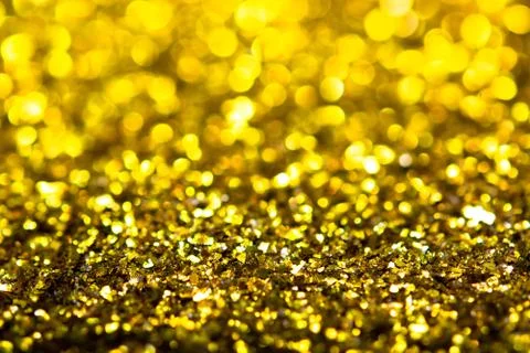 Gold glitter texture. Festive sparkling sequins background closeup. 스톡 사진