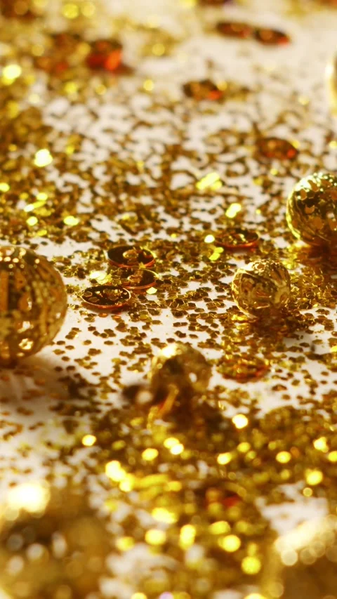 Gold Glitters on the Table Stock Footage 296055971