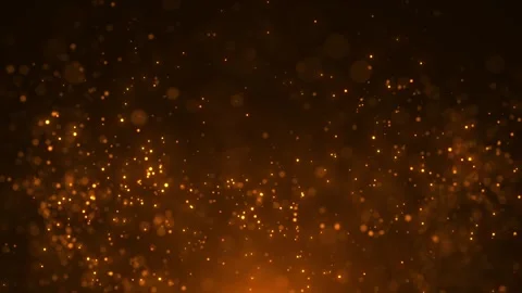 Gold glowing particles floating in the air on a dark background, creating Stock Footage 312814652