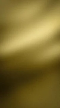 Gold gradient grainy vertical background texture with abstract blur grunge .. Stock Photos