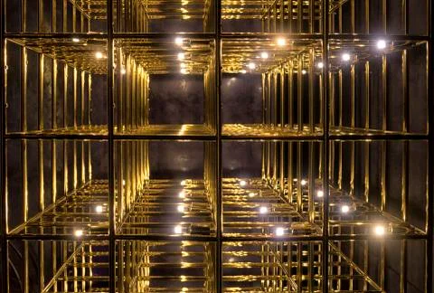 Gold grid on a black background Stock Photos