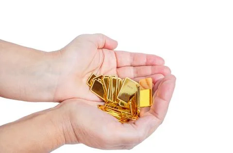 Gold on the hands isolated Stock Photos