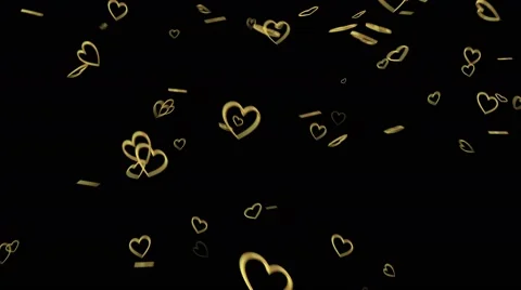 Gold heart shape rings falling Stock Footage 62879377