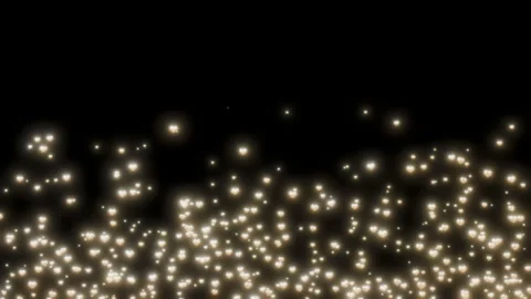 Gold hearts particles in seamless loop float and shimmer overlay on black 4K Stock Footage 299867984