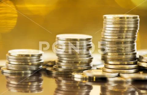 Gold investments - precious metal savings, coins Stock Photos