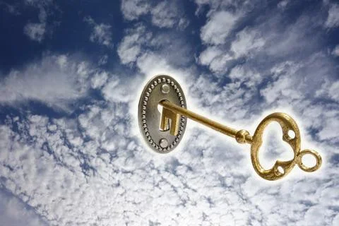 Gold key in the sky Stock Photos