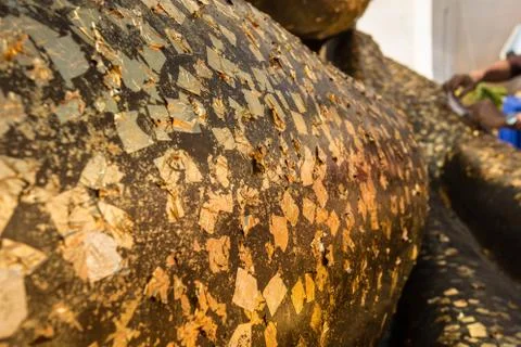 The gold leaf on buddha statue 库存照片