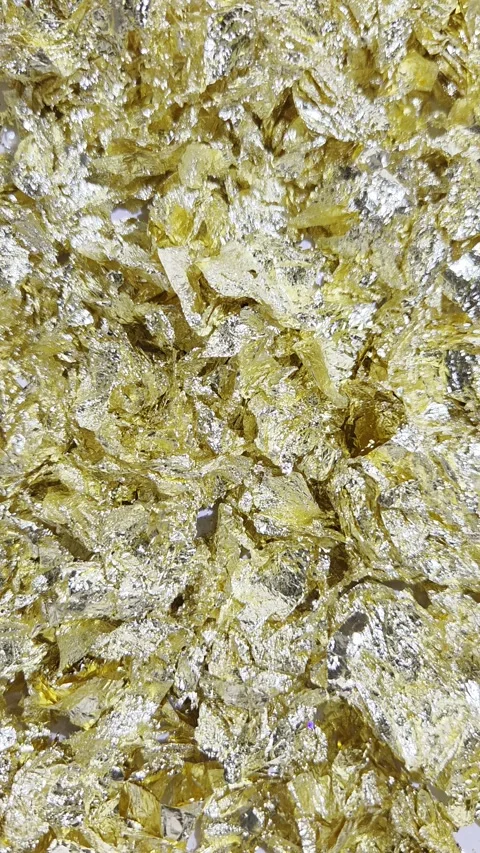 Gold leaf texture. Potal flake for art Stock Footage 339020256