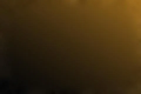 Gold light abstract background with soft hazy gradient texture for luxury v.. Stock Photos