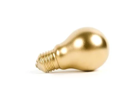 Gold light bulb Stock Photos