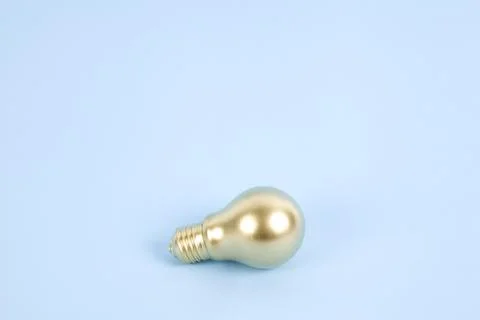 Gold light bulb Stock Photos