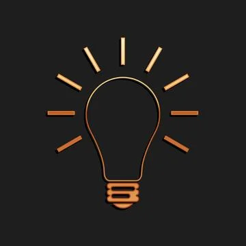 Gold Light bulb with rays shine icon isolated on black background. Energy and Stock Illustration