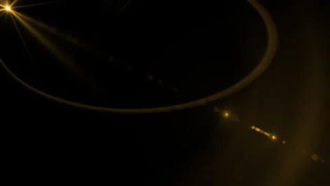 Gold light rays with lens flares art animation background on black background 動画素材 274472076