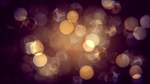 Gold lights shimmer on a purple background. Bokeh effect. Stock Footage 145206038
