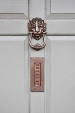 Gold lion knocker Stock Photos