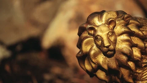 Gold Lion statue stone background nobody hd footage Stock Footage 105786038