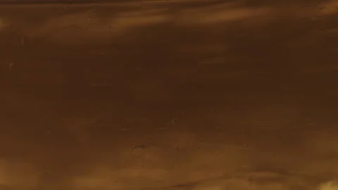 Gold Liquid Bubbles Spinning Stock Footage 255121342
