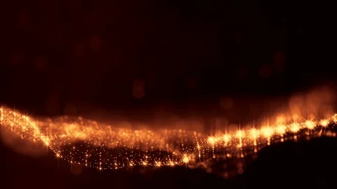 Gold loopable abstract particle background with depth of field, glow sparkles of Video stock 84415439