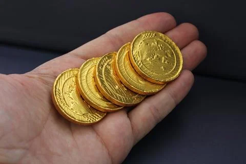 Gold in mans hand Stock Photos