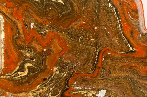 Gold marbling texture design. Red and golden marble pattern. Fluid art. Stock Illustration