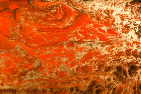 Gold marbling texture design. Red and golden marble pattern. Fluid art. Stock Illustration