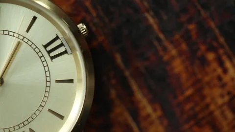 Gold metallic second arrow passing by on clock Video stock 172448771