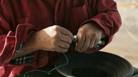 Gold miner assembling homemade pipe bomb explosive Stock Footage 102629217
