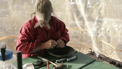 Gold miner assembling pipe bomb explosive Stock Footage 102629196