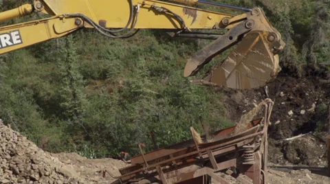 Gold Mining Alaska Side View Excavator Rocks Grizzly Slow Motion Stock Footage 36631028