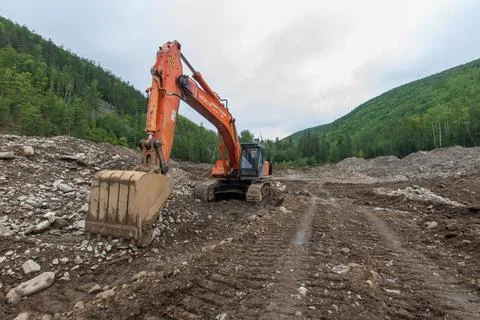 Gold mining equipment is located in the developed area Stock Photos