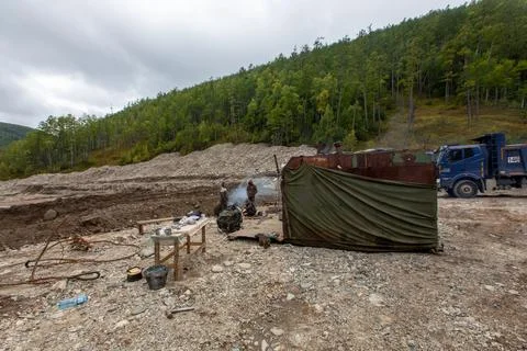 Gold mining equipment is located in the developed area Stock Photos