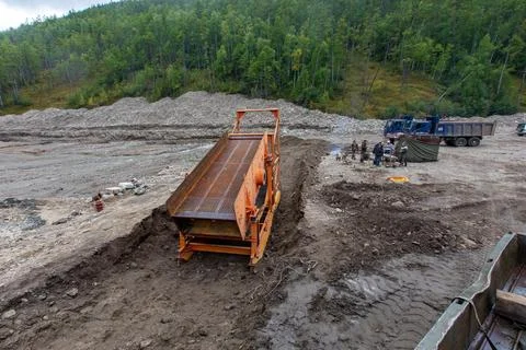 Gold mining equipment is located in the developed area Stock Photos