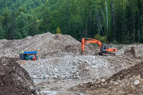 Gold mining equipment is located in the developed area Stock Photos