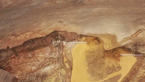 Gold mining. Flushing the rock with powerful jet of water using pumps Video stock 158230235