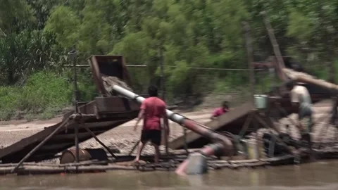 Gold-mining on the riverbank of Tambopata Stock Footage