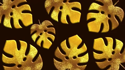 Gold monstera leaves pattern on dark background with glitter texture Stockbeeldmateriaal 330436492