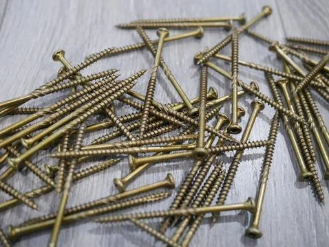 Gold multi purpose screws Stock Photos