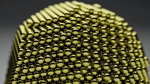 Gold nanoparticle spinning white backdrop, Abstract background nanotechnology Stock Footage 240752992