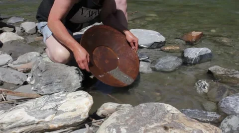 Gold Nugget mining from the River Stock Footage 63172531