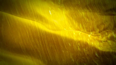 Gold oil Flag Wave Loop waving in wind. abstract gold liquid. Golden rich wave Stock Footage 109496895