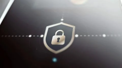 Gold padlock centered inside dark shield Stock Photos