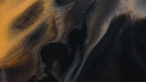 Gold Paint On Black Background Stock Footage 206555292