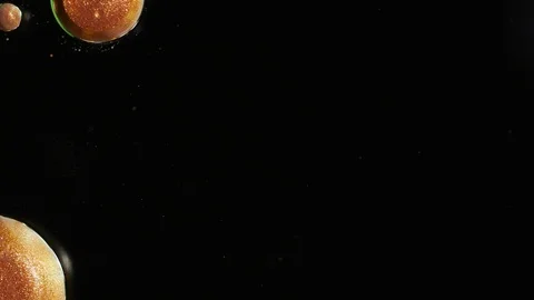 Gold paint bubbles on a black background Stock Footage 88328418