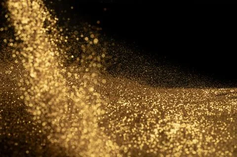 Gold particle dust for background Stock Photos