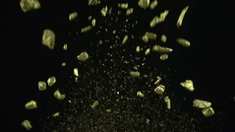 Gold Particles Exploding Stock Footage 94334914