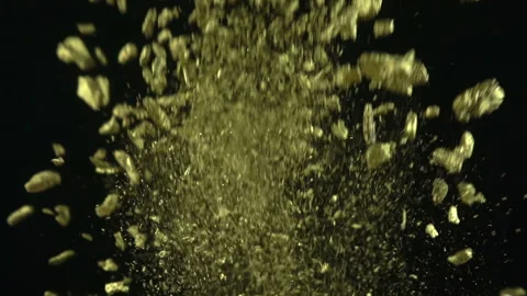Gold Particles Exploding Stock Footage 94334981