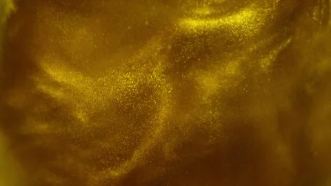 Gold particles floating background, Liquid gold, golden abstract backdrop Video stock 314583949