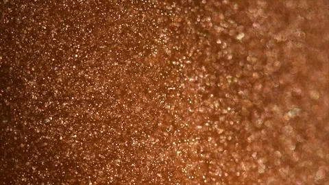 Gold particles floating background, magic dust, Liquid gold, golden backdrop Stock Footage 318345046