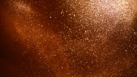 Gold particles floating background, magic dust, Liquid gold Video stock 329914828