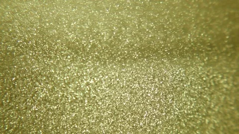 Gold particles Stock Footage 76993012